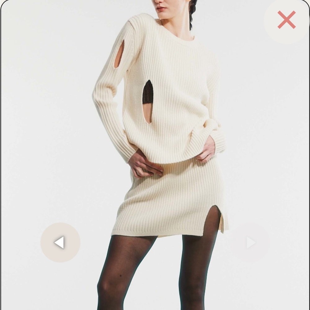 Theopen product asymmetric cut out knit sweater